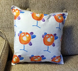 12" square Pillow with orange and blue watercolor taino symbol from Puerto Rico