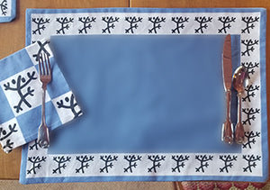 Large Blue Place Mats with four sidedborder of dancing Taino coqui frogs